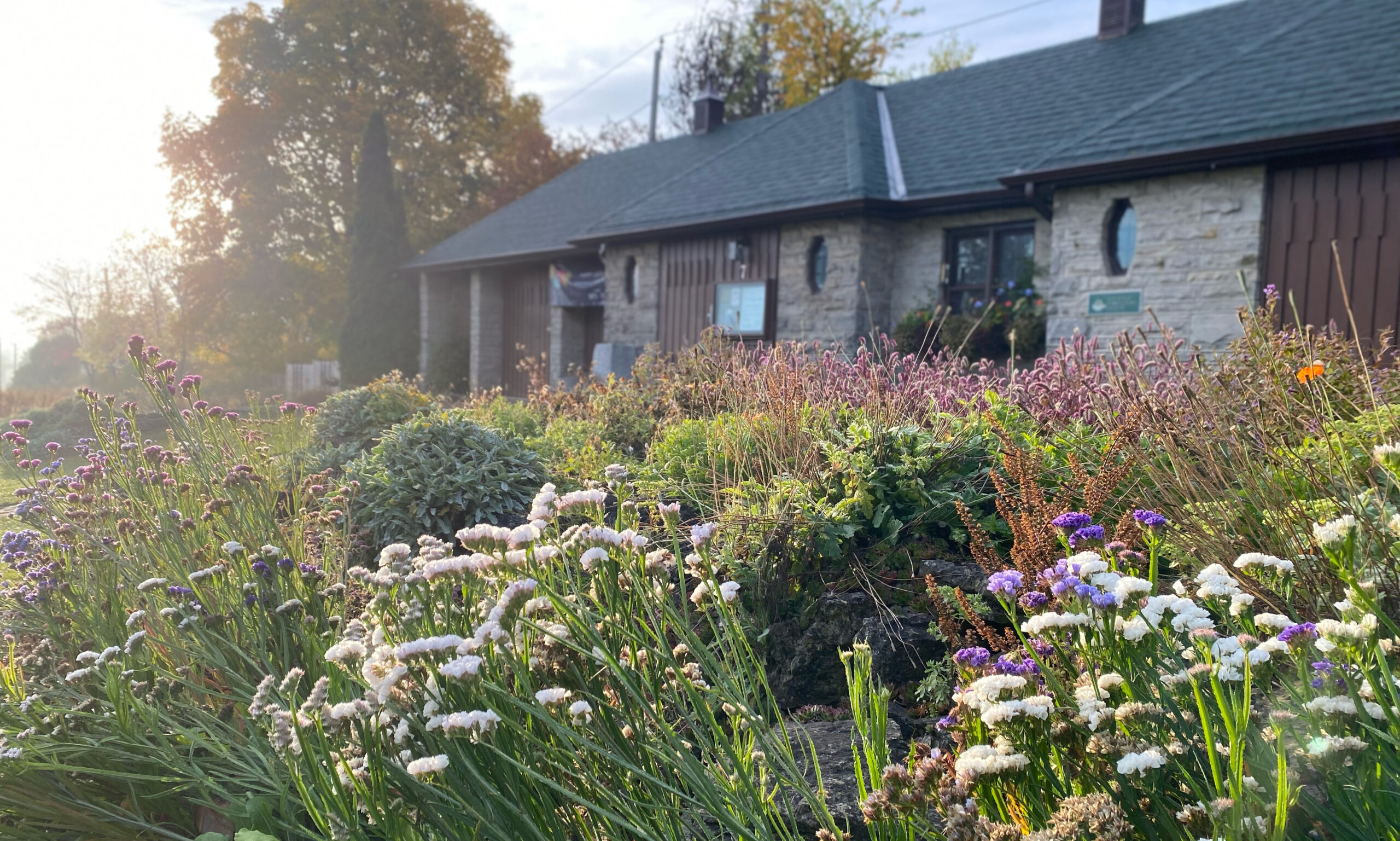 An autumn garden in front of the Garden House at Rockway Gardens